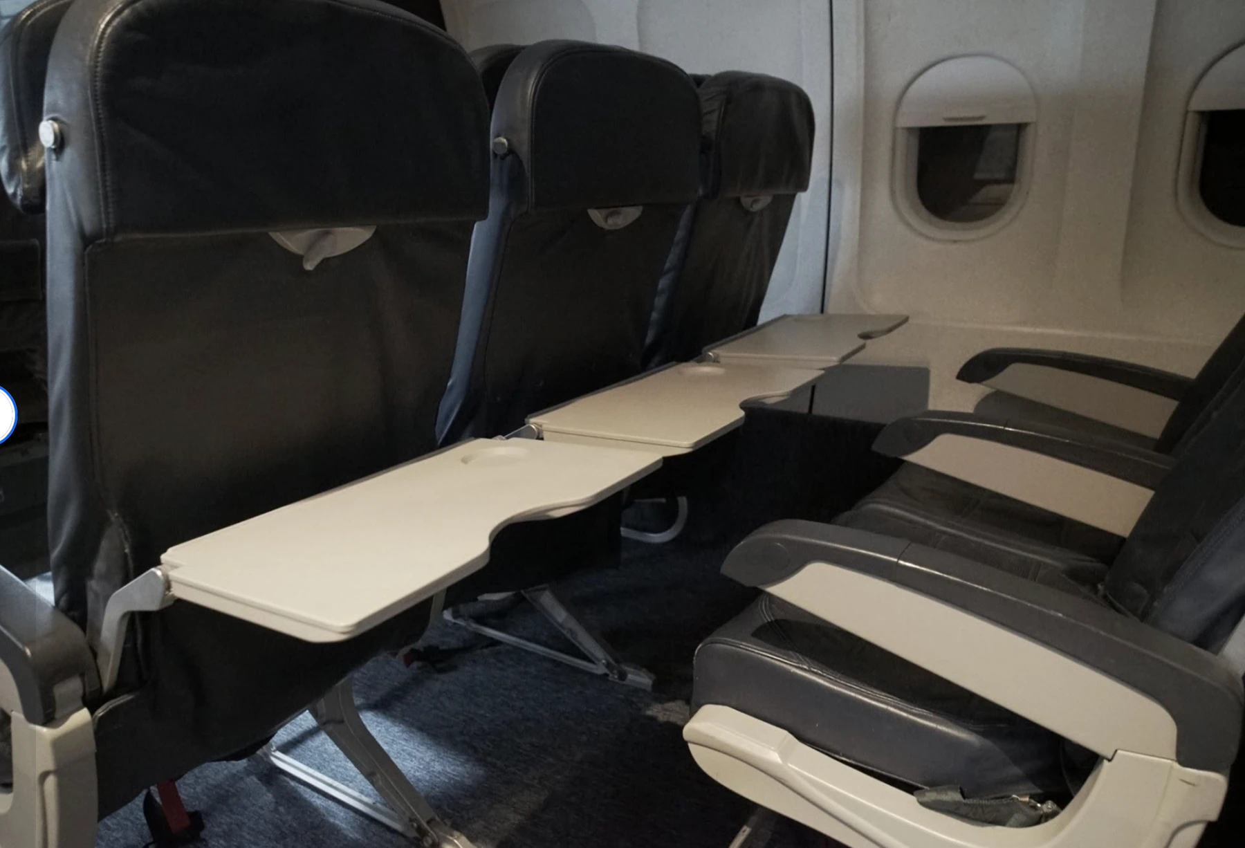 Cabin seating and tray tables