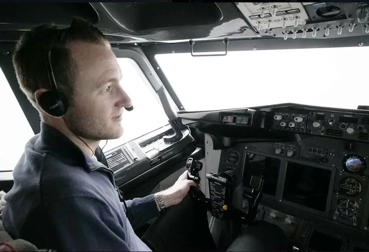 737 simulator participant at the flight controls