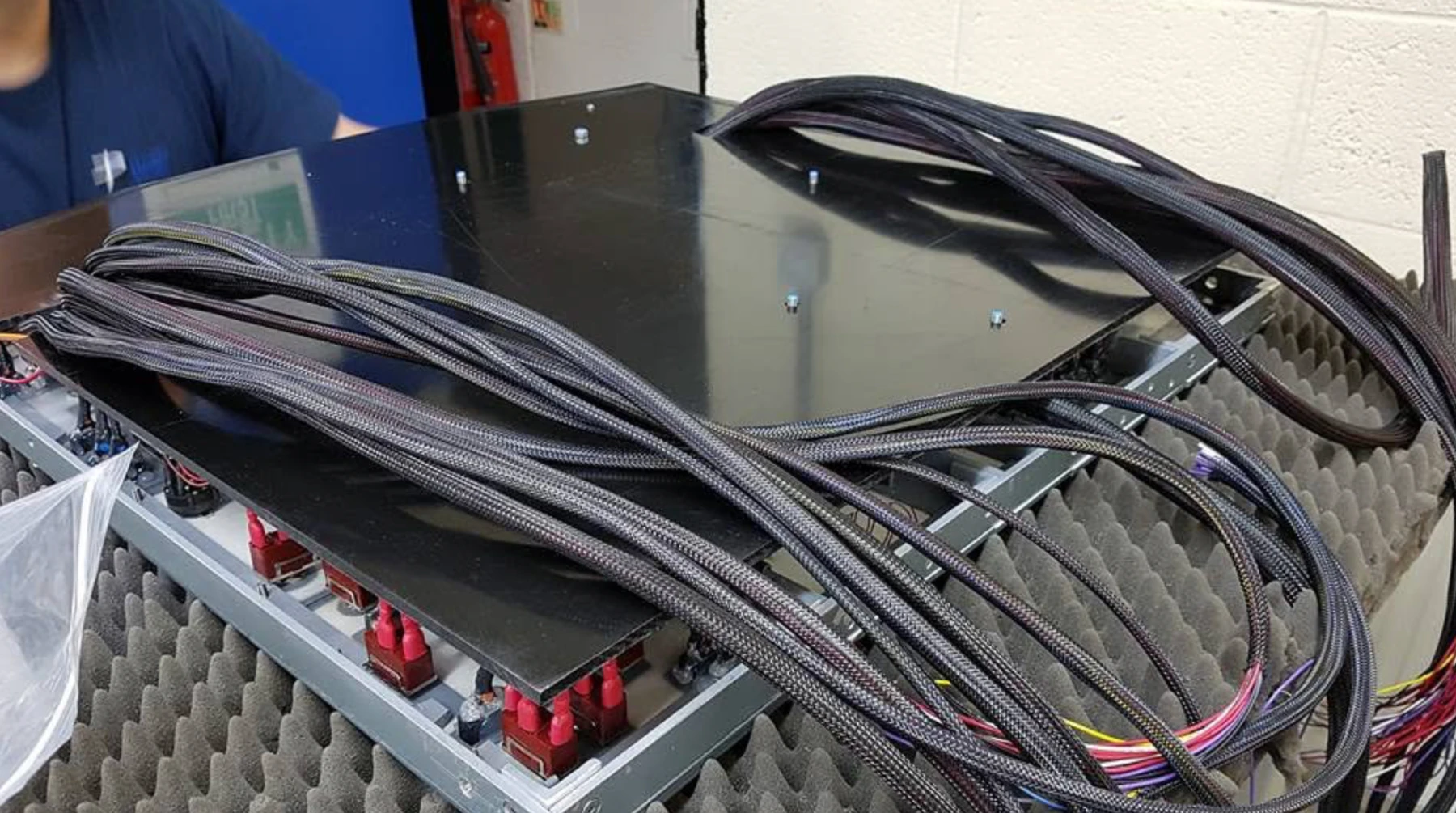 Overhead prototype with braided wiring looms