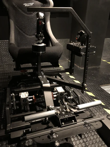 Motion frame, control mounts and pedals
